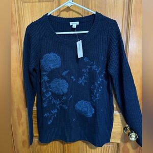NWT Navy sweater with floral design in front.  Size med
